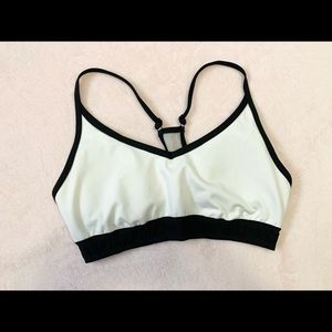 White & black VS Pink sports bra